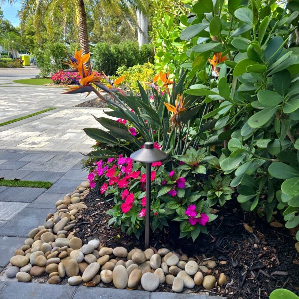 Downtown Naples Private Residence Design by Metis Landscapes Pavers Installation and maintenance by Love's Landscape