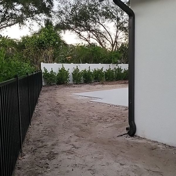 Side Yard Putting before | Love's Landscape Landscape Installation & Maintenance Company