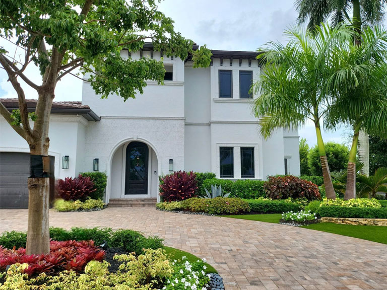 Waterfront Private Residence - Design & Install of Landscape, Lighting, and Paver Renovation by Love's Landscape